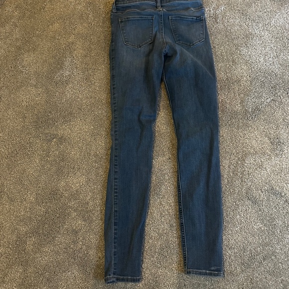 Skinny jeans with rips . - Picture 2 of 2